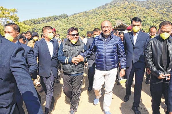 CM inspects solid waste t CM inspects solid waste t