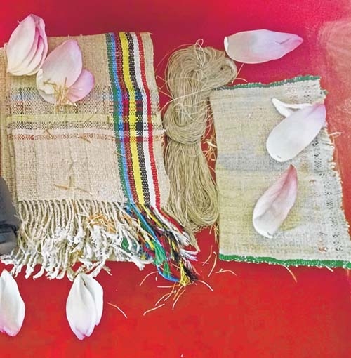 Woman reels yarn off lotu