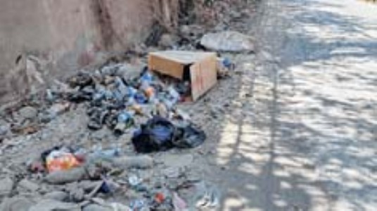 Road converted to dumping site